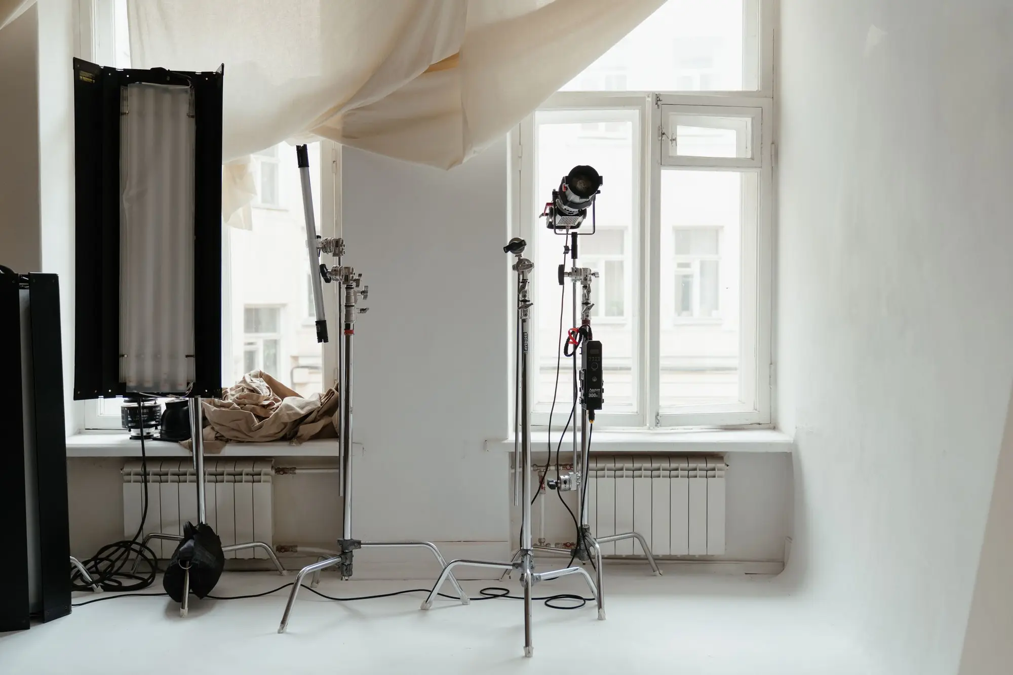 A bright creative studio with lighting equipment set up